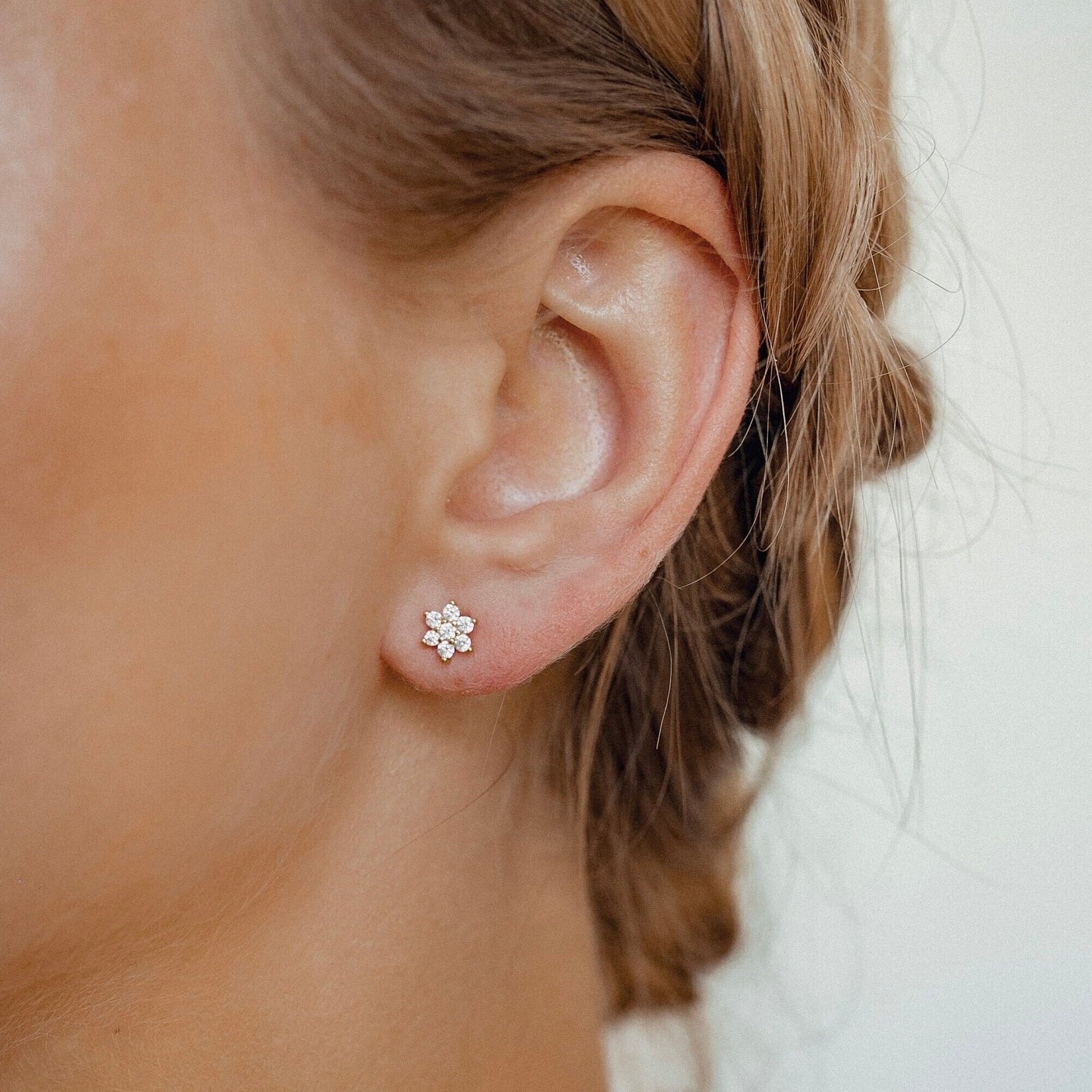 14k yellow gold floral earrings with c.z.
