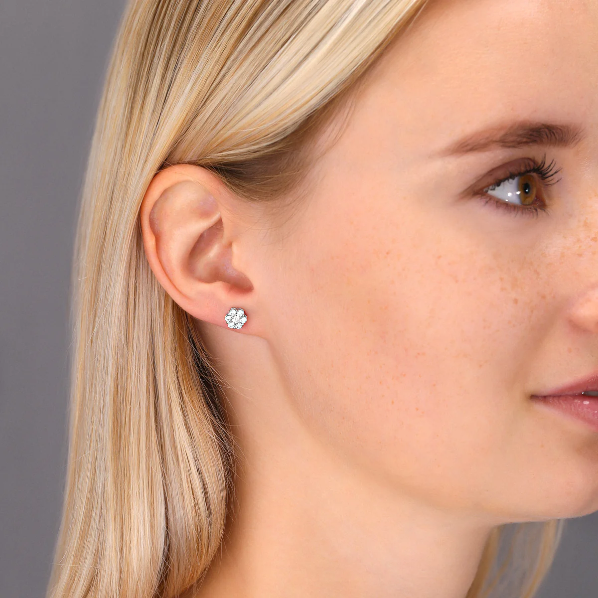 14 k white gold floral cluster stud earring with 0.495 c.t. natural diamonds